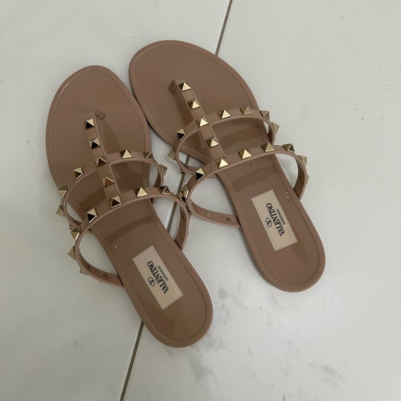 Valentino women’s studded flip flops in tan ?